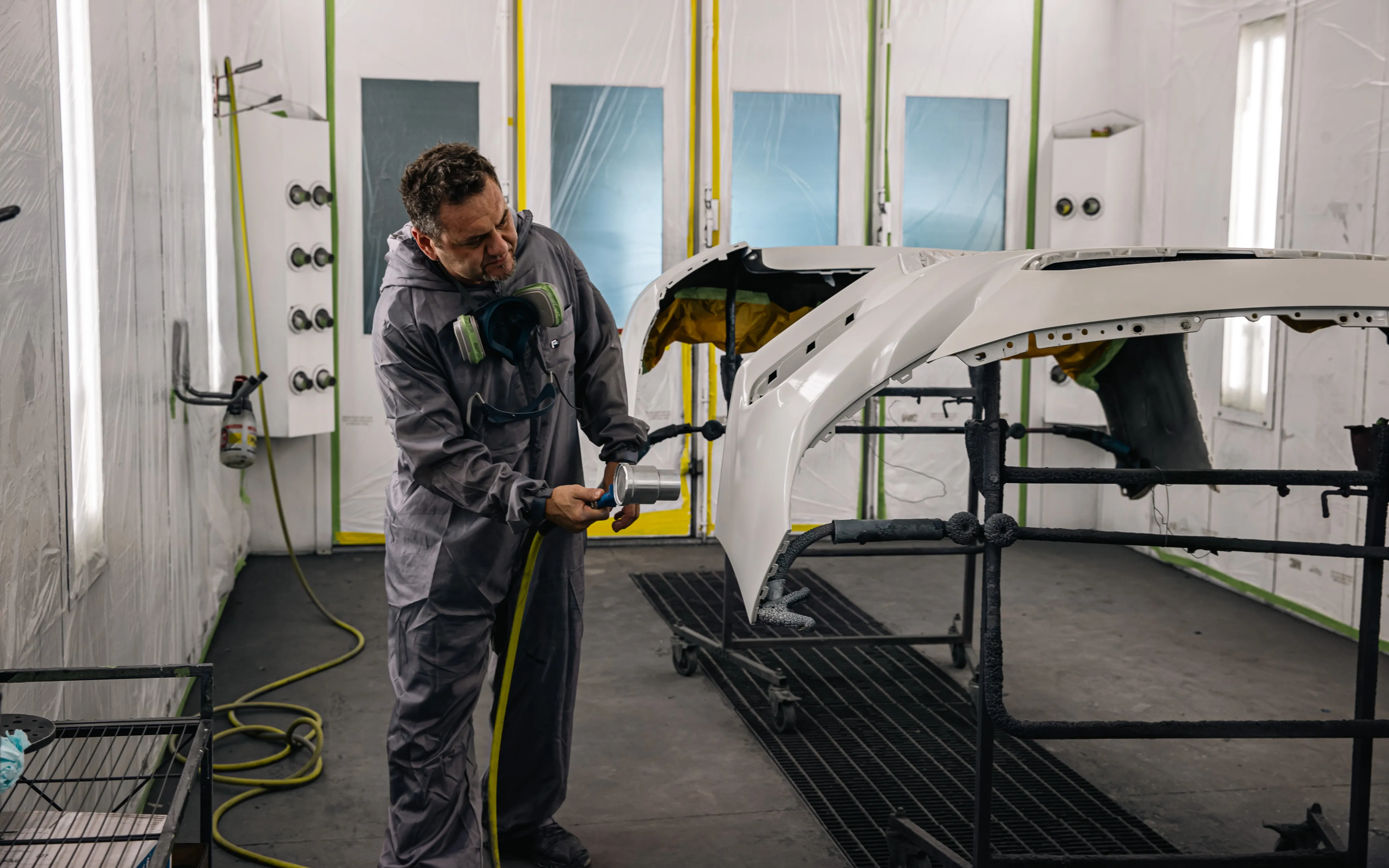 Professional spray paint booth at YD Motorsports detailing workshop
